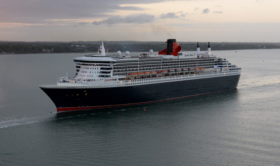 Happy Birthday Queen Mary 2! Cunard's Three Queens celebrate the flagship's 10th anniversary in dramatic style, Southampton, ENGLAND. UK.